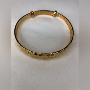 Gold bracelet and earrings